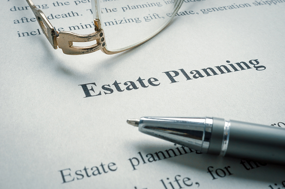 A pen sitting on a estate planning document.