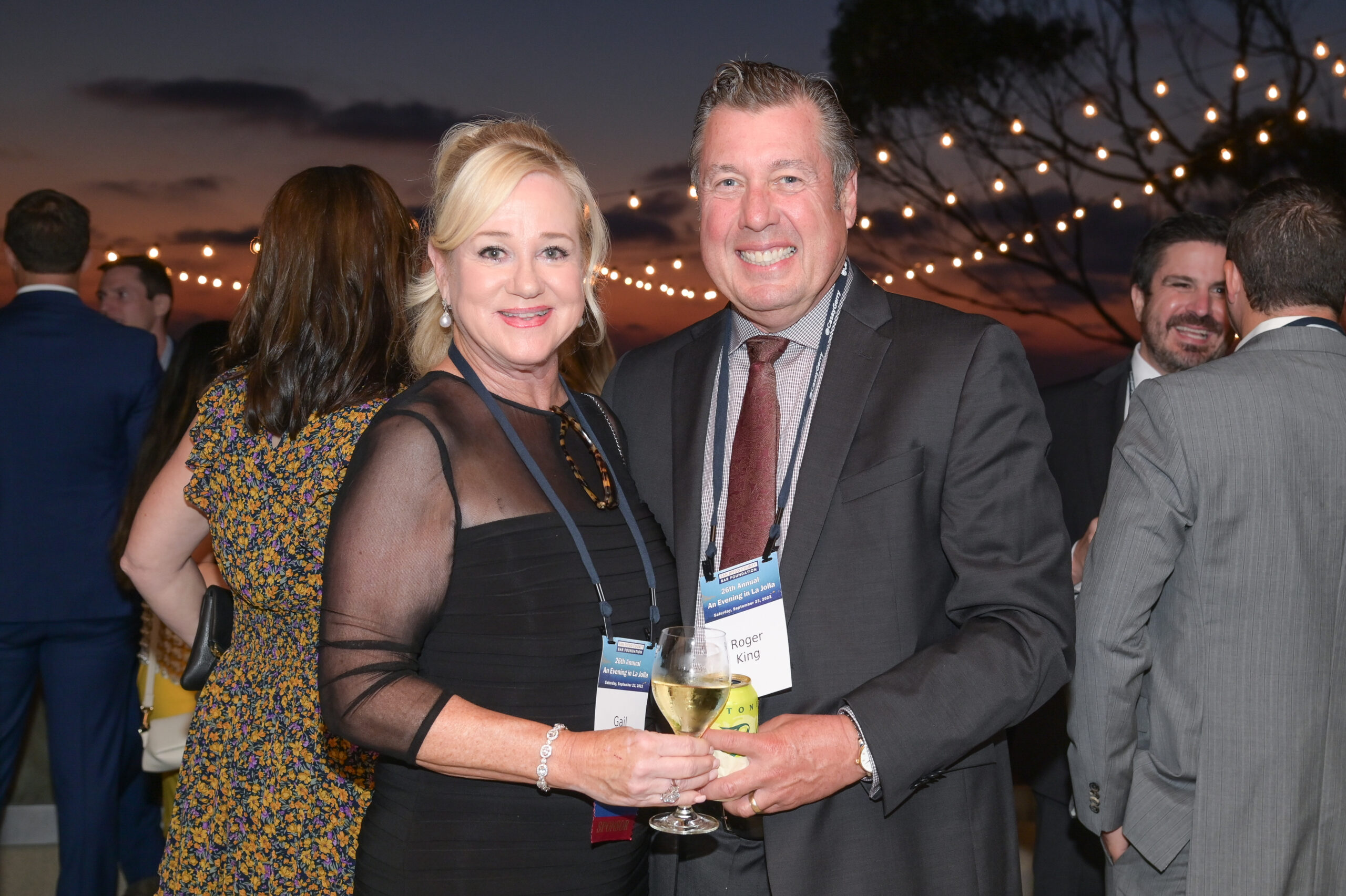 Smiling couple celebrating at the Evening in La Jolla 2024 event.