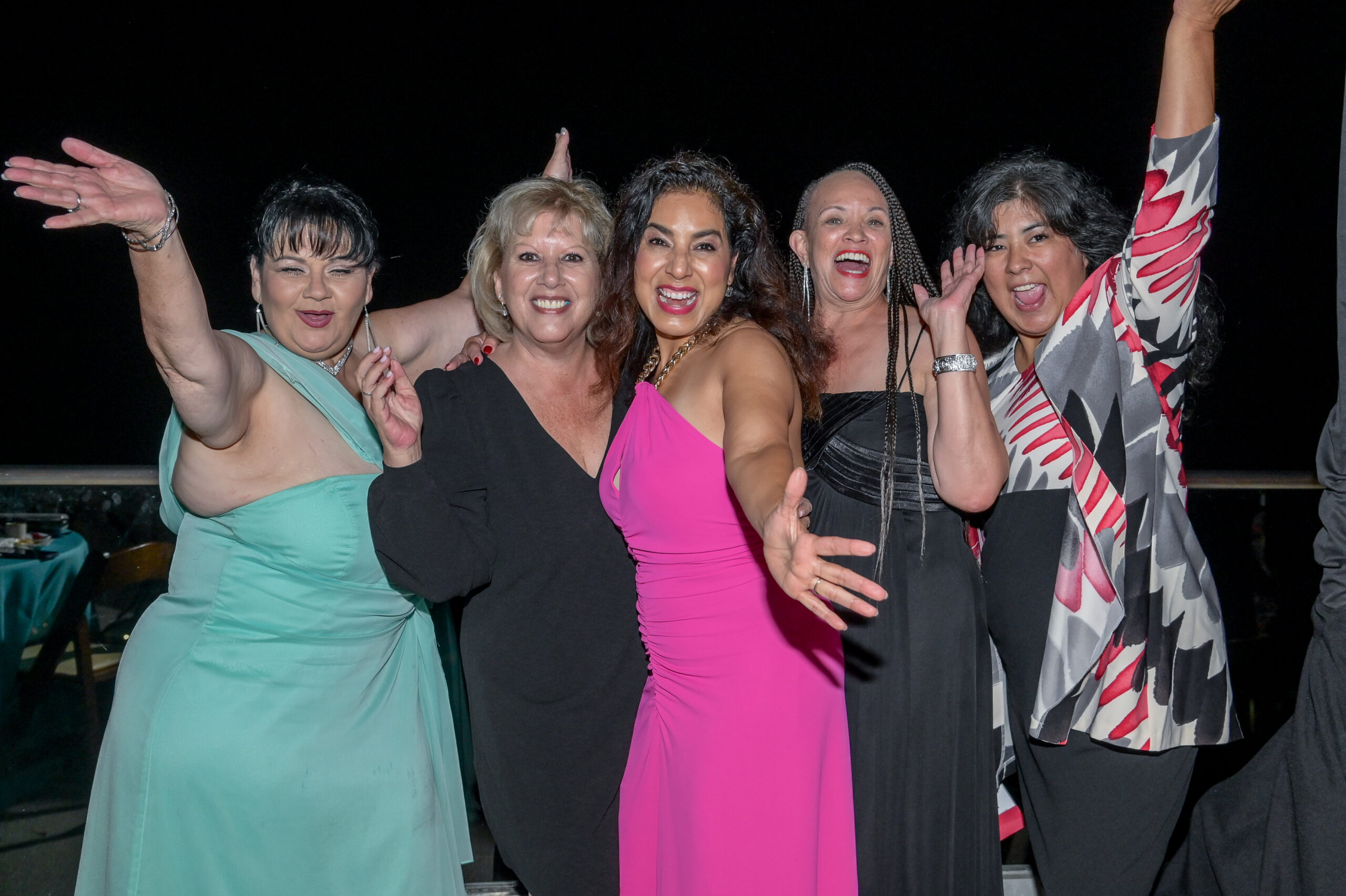 5 laughing women celebrating at the Evening in La Jolla 2024 event.